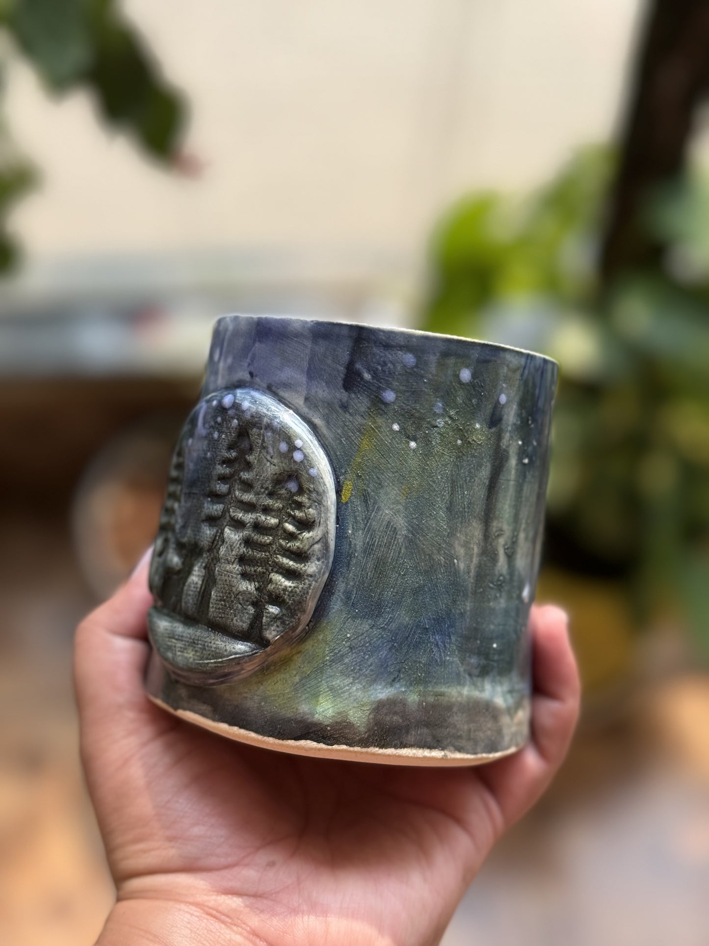 Earthy stoneware cup with a natural glazed texture – SreeStudio