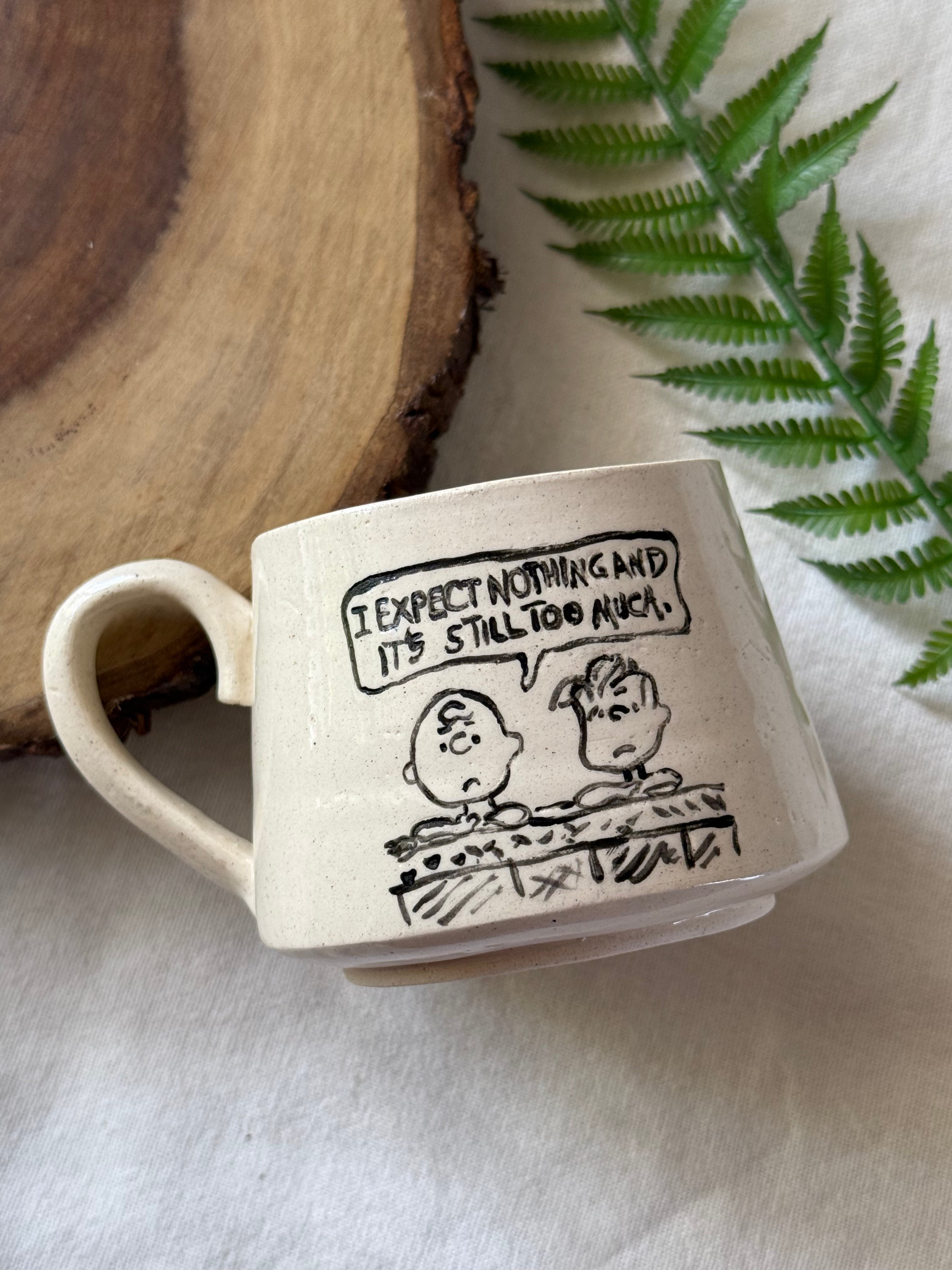 Charlie “Expect Nothing” Mug